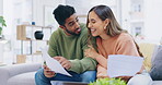 Home, documents and happy couple on sofa with mortgage application, financial management and budget success. Biracial people on couch in their apartment with paperwork for title deed, loan or finance