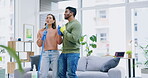 Dance, singing and a couple spring cleaning the living room of their home together while having fun with housework. Love, dancing or music with a man and woman cleaner in their house to clean