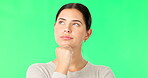 Face, idea and option with a woman on a green screen background in studio to consider a decision. Thinking, mind and contemplating with an attractive young female looking thoughtful on chromakey