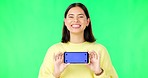 Happy woman, phone and mockup on green screen with tracking markers for advertising against studio background. Portrait of female with smartphone display for advertisement or marketing on copy space