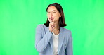 Green screen, happy woman and secret wink of face, finger on lips and business privacy. Portrait of female model, silence and quiet employee smile for gossip, whisper emoji and trust in surprise deal