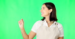 Mockup, green screen and woman pointing at product placement space isolated in a studio studio background. Deal, sale and portrait of female showing advertising, marketing and a choice or option