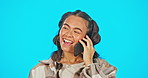 Phone call, laughing and woman isolated on blue background for social network, funny conversation and chat online. Happy gen z person with communication, networking and feedback or news in studio