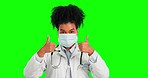 Green screen doctor, covid and woman with face mask for virus safety, medical healthcare or hospital security policy. Thumbs up satisfaction, chroma key portrait and female nurse on studio background