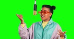 Green screen microphone, music singer and woman singing lyrics, recording song track and hip hop rapper performance. Celebrity musician, chroma key artist and gen z female rap on studio background