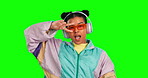 Green screen face, music and woman dance to podcast song, radio sound or listening to audio on studio background. Headphones portrait, crazy dancing energy or retro female dancer on mockup chroma key