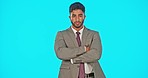 Serious face, business man and arms crossed in studio isolated on a blue background mockup. Ceo, portrait and proud, assertive and confident entrepreneur or person from India with pride for career.