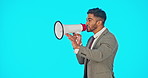 Business man, speaker and megaphone isolated on blue background broadcast, breaking news or announcement. Profile of professional person with voice, warning and attention, opinion or speech in studio