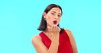 Woman face, pointing and studio with happiness and beauty smile showing mockup for advertisement. Portrait, isolated and blue background with a happy young female point to show mock up announcement