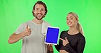 Green screen, thumbs up and people with a tablet membership for gym isolated on studio background. Happy, advertising and face portrait of man and woman with mockup on tech to join fitness program