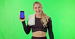 Woman, phone and winner portrait on green screen for gym or exercise app progress on website. Excited influencer girl with smartphone to celebrate fitness goal, competition win or discount in studio
