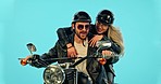 Travel, blue background and couple speed on motorcycle for adventure, road trip and holiday mockup. Motorbike, transport and man and woman ride together for weekend, vacation and trip in studio