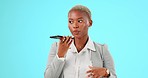 Phone, voice note and face of black woman on blue background for planning, strategy and business. Communication, network and girl on smartphone for conversation, talking and chatting online in studio