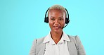 Black woman, callcenter and face, phone call and contact us, CRM and mockup with talking on blue background. Portrait, help desk and female consultant in studio, headset with mic and customer service