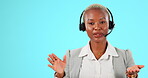 Hands, call center and portrait of woman talking for customer support, sales or choice in studio. Black female agent working for telemarketing and advertising mockup space option on blue background  