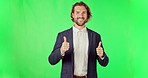 Face, pointing and man with thumbs up on green screen in studio isolated on a background mockup. Portrait, hand gesture and success of professional with happiness, like emoji or agreement, ok or vote