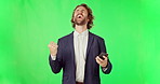 Phone, winner and man celebrate on green screen in studio isolated on mockup background. Surprise, cellphone or excited business person in celebration of winning competition, bonus prize or promotion