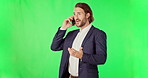 Phone call, talking and business man on green screen in studio isolated on a mockup background. Cellphone, conversation and happy professional person in discussion, speaking or chatting with contact.