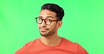 Spectacles, face and male in a studio with green screen for optical awareness, wellness and health. Wink, flirt and portrait of an Indian man model with glasses for eye care by chroma key background.