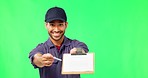 Delivery man, clipboard and signature on green screen, smile on face with logistics and shipping on studio background. Portrait, ecommerce and distribution with mockup, happy male with supply chain