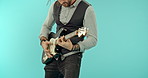 Crazy, music and guitar with man in studio for performance, rock and concert. Metal, creative and entertainment with male and instrument isolated on blue background for dance, punk and musician