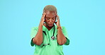 Burnout, nurse and black woman with headache, pain or tired in studio isolated on a blue background mockup. Migraine, female medical professional and sick, fatigue or depression, brain fog and stress