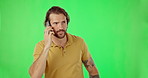 Phone call, talking and man on green screen in studio isolated on a mockup background. Cellphone, connection and person struggling to make conversation, speaking or chatting with contact on mobile