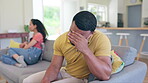 Couple, separation and argument on sofa in disagreement, conflict or divorce in living room dispute at home. Angry or upset man and woman on couch in depression after fight, ignore or disagree