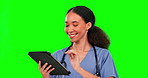 Tablet, nurse smile and woman on green screen in studio isolated on background. Technology, medical professional and happy person or surgeon in online consultation, telehealth or healthcare research.