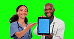 Tablet, teamwork and doctors pointing to green screen in studio isolated on a background. Technology, face portrait and happy medical nurse, woman and black man with advertising, marketing or mockup.