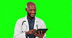 Tablet research, doctor and black man on green screen in studio isolated on a background mockup. Medical professional, technology and happy person or surgeon with online healthcare or telehealth.