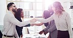 Teamwork, handshake and happy business people with client for partnership, deal agreement and thank you. Collaboration, corporate meeting and men and women shaking hands for b2b success in office