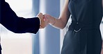 Teamwork, handshake and business man and woman for partnership, deal agreement and working together. Collaboration, corporate office and people shaking hands for onboarding, greeting and recruitment