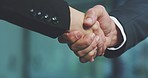 Collaboration, handshake and hands of business people for partnership, deal agreement and thank you. Teamwork, corporate office and closeup of managers shaking hand for success, welcome and greeting