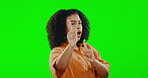 Face, green screen and woman with finger guns pointing to you. Female smiling, person gesture for direction or space with inspiration and decisions or choices against studio background or chromakey