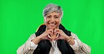 Face, green screen and senior woman hiking, heart sign and happiness on a studio background. Portrait, female hiker and mature person with symbol for love, health and wellness with fitness and smile