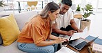 Couple, documents and calculator for bills, budget or planning financial administration on laptop at home. Man, woman and calculate finance payment with paperwork, online banking or investment growth