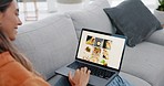 Woman, laptop and checking food website on living room sofa for ecommerce, online shopping or meal at home. Female lying on couch browsing restaurant homepage or store for lunch or dinner on computer