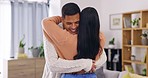 Couple, love and happy to hug in home for care, romance and quality time together. Man, smile and hugging woman for affection, support and relax in apartment with partner, relationship and happiness 