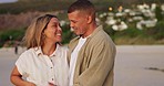 Pregnancy, beach and happiness, couple in celebration of love and family in nature and romance. Celebrate, happy man and pregnant woman, new parents at ocean hug with smile and hope for future baby.