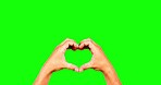 Snap, heart, broken and hands on a green screen isolated on a studio background. Heartbreak, love and fingers snapping with change, grabbing and different hand gesture on a chromakey backdrop