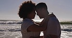 Happy couple, beach and sunset with head together for vacation, love and laughing in summer. Man, woman and comic happiness with profile by ocean, waves or journey for honeymoon holiday in Brazil