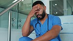 Doctor, man and headache in stress on stairs from burnout, overworked or strain at the hospital. Tired and stressed male medical professional suffering bad head pain, fatigue or mental health anxiety