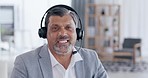 Businessman, video call and headphones consulting in virtual meeting, customer service or telemarketing at office. Portrait of happy man consultant agent with headset for online advice or contact us