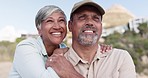 Happy, bird watching and senior couple in nature while on a vacation, adventure or weekend trip. Happiness, love and elderly man and woman pensioners having fun together outdoor on retirement holiday