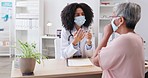 Doctor, senior woman and talking with mask for consultation, healthcare and listening at clinic. Female medic, elderly patient and conversation with empathy, kindness and advice in hospital office