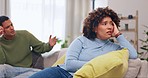 Sad couple, thinking and conflict in home for marriage problem, cheating or infidelity. Stress, divorce and man and woman on sofa in living room for breakup fight, depressed and relationship fail.