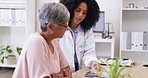 Senior woman, doctor talk and medical consultation in a hospital office with communication and results. Elderly patient, worker and support from cancer news in a clinic with a tablet and report