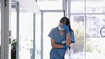 Stress, woman nurse and anxiety in a hospital with a face mask worried about cancer results. Burnout, healthcare clinic and covid nursing stressed about surgery and medical problem and risk at work