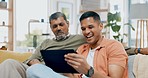 Senior father, son and tablet with funny video, movie or meme on sofa together in family home for bond. Men, mobile touchscreen and laughing with happiness, love and social media app in quality time